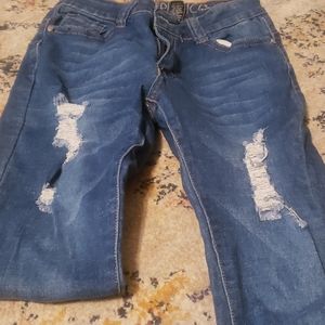 Cute distressed jeans on front and back side